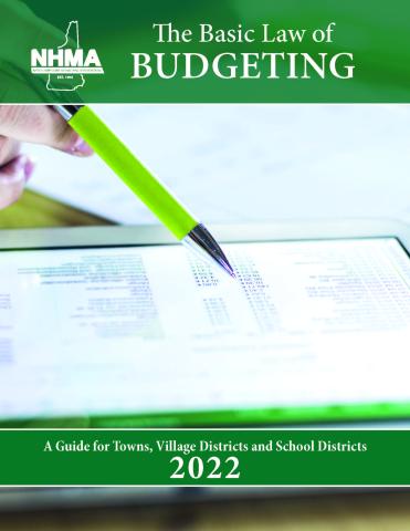 Basic law of budgeting cover; Pencil writing on ledger page