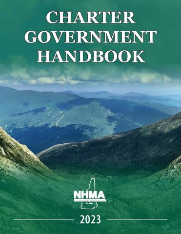 Charter Government handbook cover, photo of green valley with book title at top in white lettering